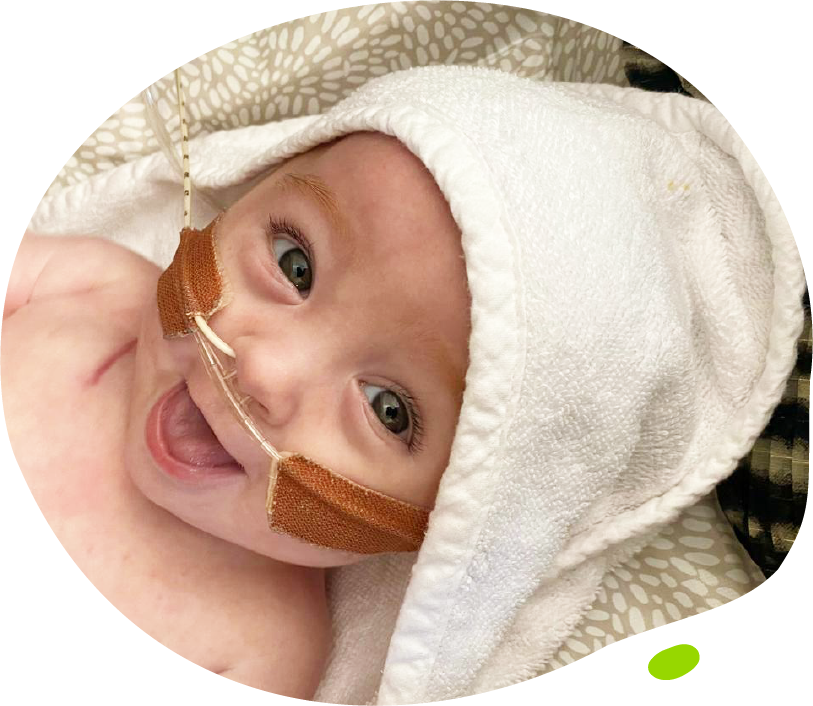 Ella's Mito Mission - Ella smiling in towelling