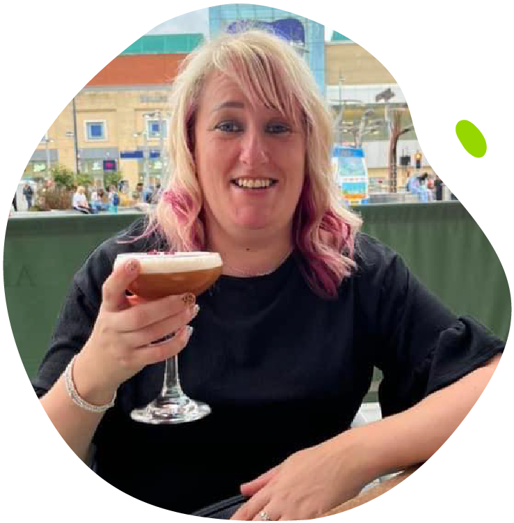 Clare's Mito Mission - Clare with a drink