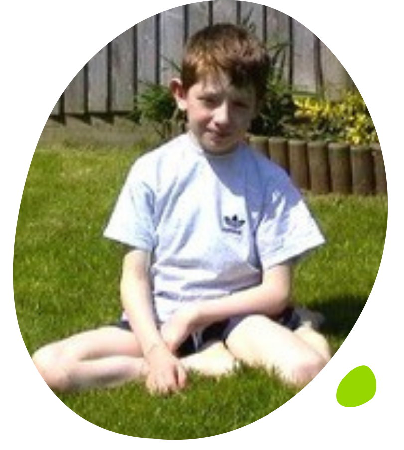 Rory's MM Rory sitting on grass