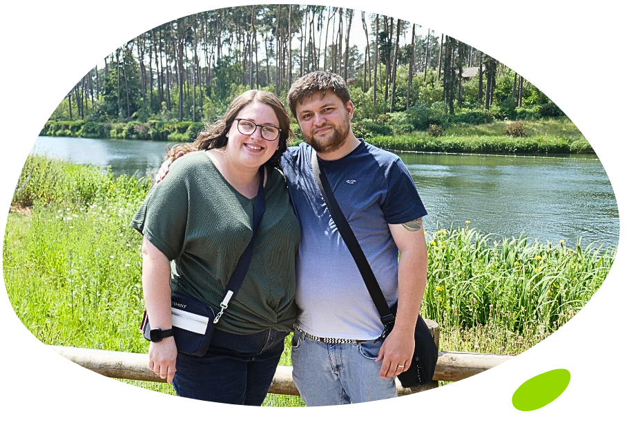 Daniel with sister by a llake