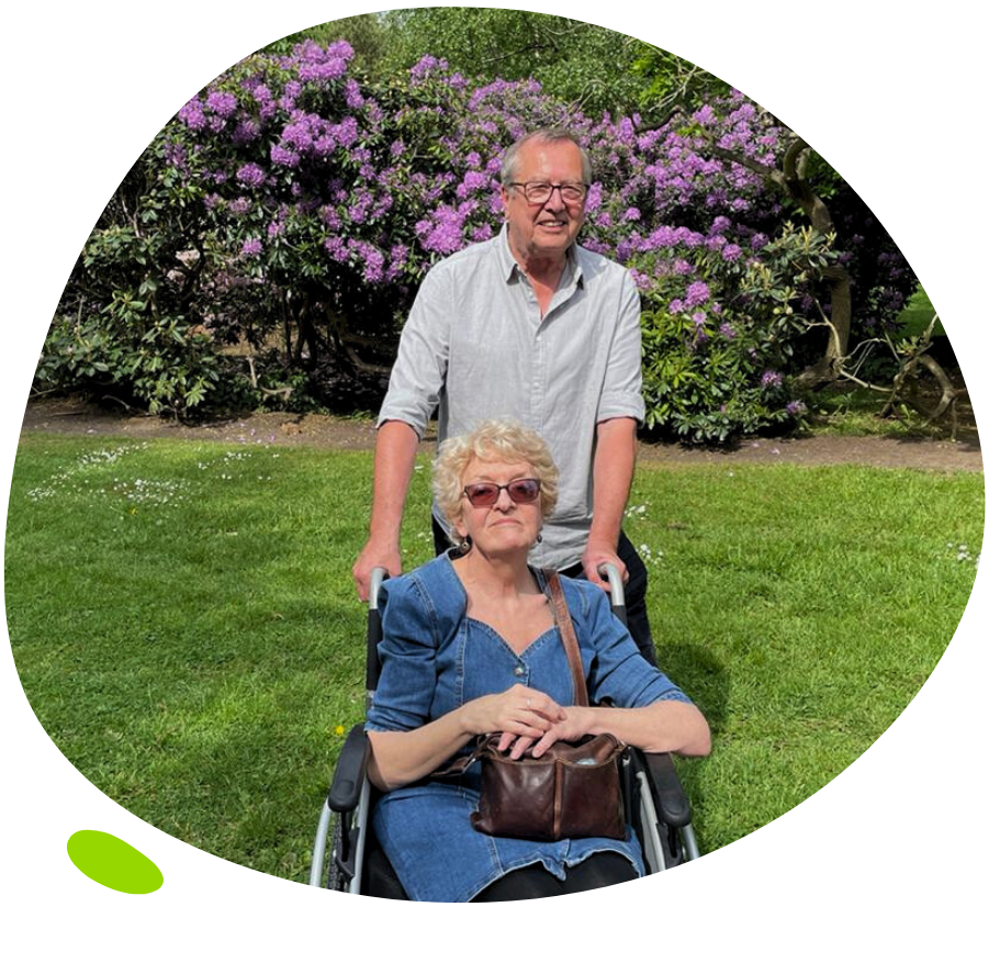 Laura in garden in wheelchair