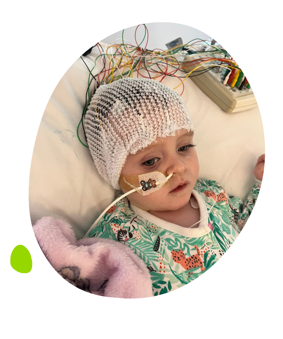 Callie wearing hospital gown