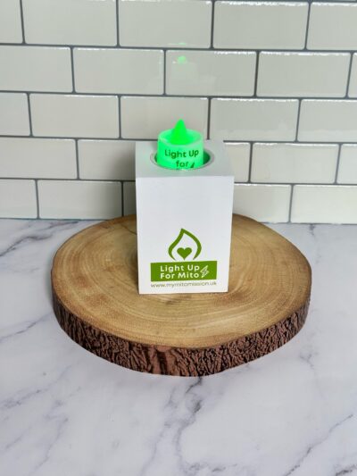 Tealight holder with lit LED candle