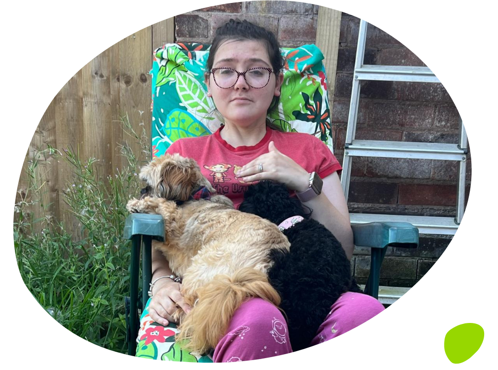Lauren in garden with dogs