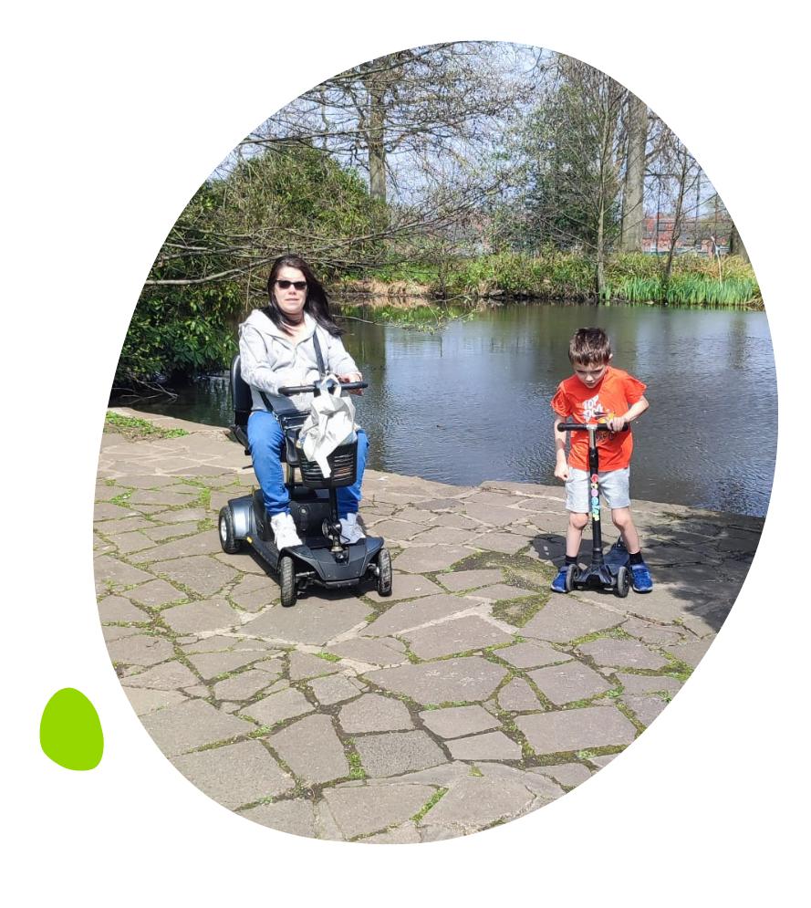 Clare on mobility scooter George on scooter